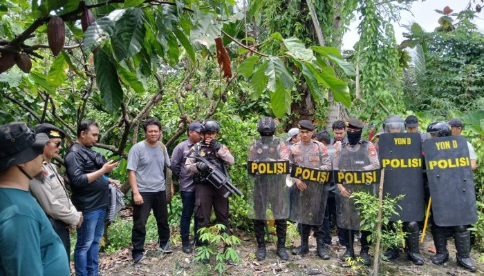 Polres Luwu Utara Bersama Satbrimob Polda Sulsel Lakukan Pengamanan Eksekusi Lahan Irigasi